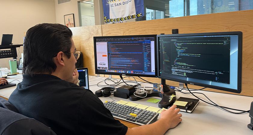 A developer creating custom code for an eCommerce website